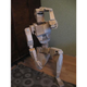 Illustration for article titled A life-sized Cylon made out of wood